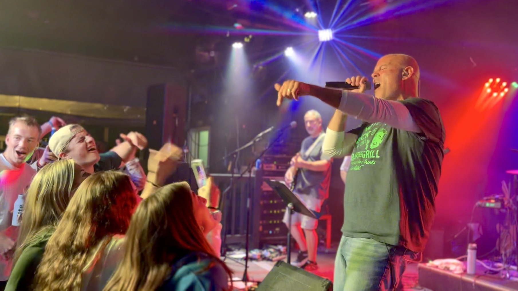 lead singer singing to crowd